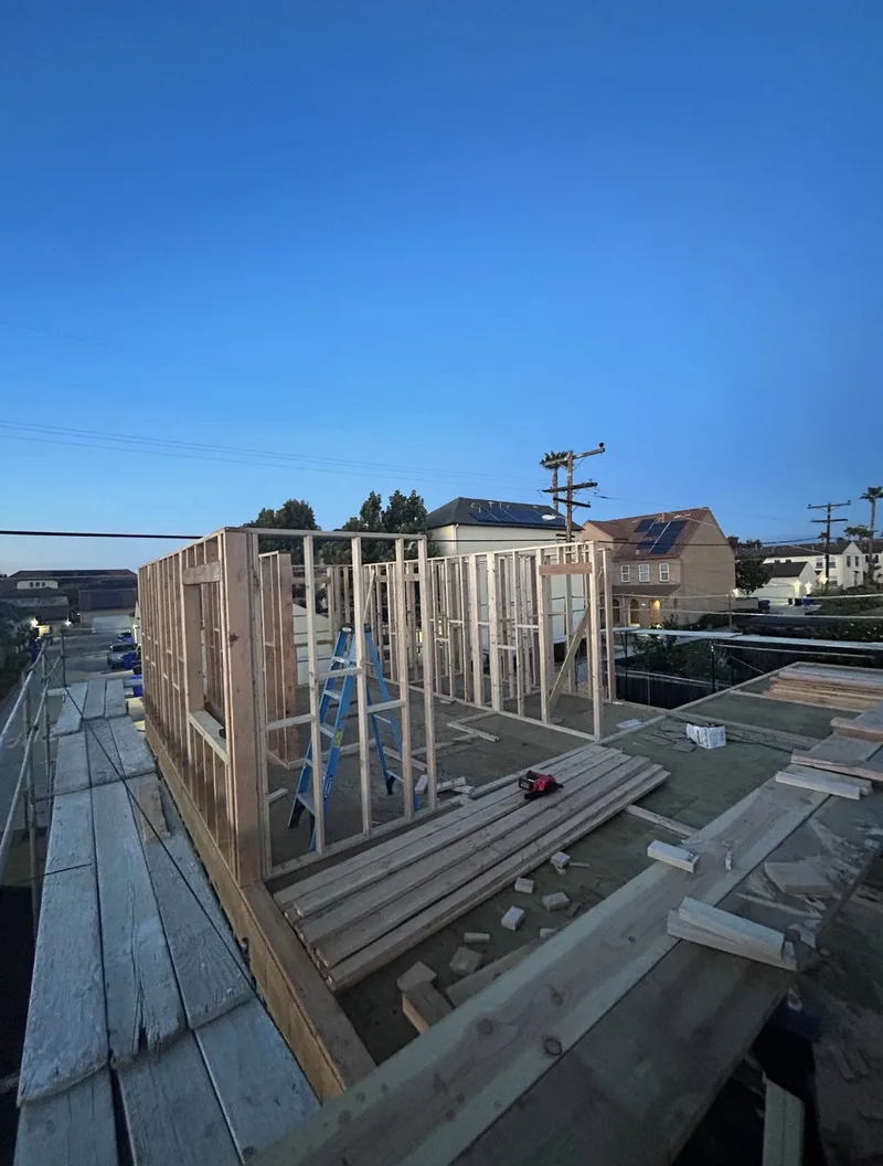 Second-story addition framing on top of existing structure